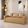 Classic beige leatherette sofa cum bed with storage in a modern living room with marble accent wall