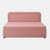 Rose diwan cum bed with storage in pink upholstery, padded headboard, front studio view