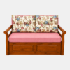 Nirva wooden sofa cum bed with storage in pink floral upholstery, front view