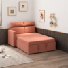 Rocco peach sofa cum bed opened into a sleeping surface with a pull-out base, matching upholstered panels, and cushioned backrests in a contemporary living room.