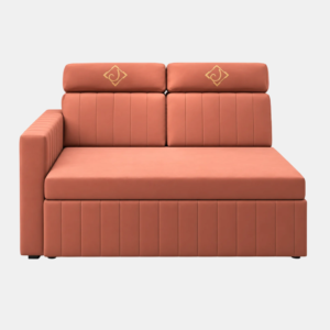 Rocco peach sofa cum bed displayed in a modern living room with wooden flooring, black wall panelling, decorative shelves, and framed artwork.