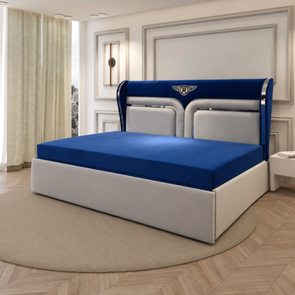 Skye royal-blue and white Diwan Cum Bed displayed in a modern bedroom with beige curtains, decorative wall mouldings, wooden flooring, and a round rug.