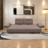 Faye Sofa Cum Bed with its backrest transformed into a flat sleeping surface in a modern living room.