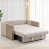 Milo beige sofa cum bed unfolded into a bed with an extended sleeping surface and ribbed upholstered armrests.