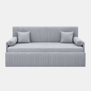Cleo grey sofa cum bed with a vertically channelled backrest, matching bolster cushions, and a wide upholstered front panel.