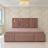 Dan Diwan Cum Bed with dusty rose upholstery and gold accents in an elegant bedroom