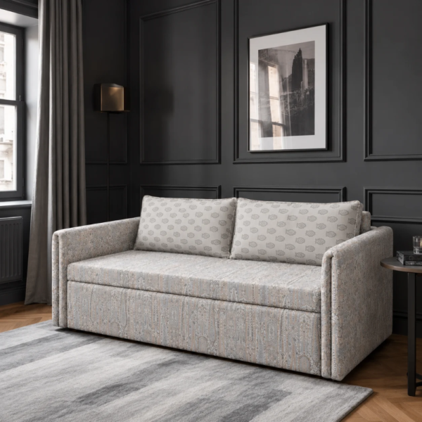 Ellis beige patterned sofa cum bed styled in a modern living room with dark walls and framed artwork.
