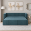 Felix teal blue sofa cum bed extended into a bed with a matching upholstered sleeping surface